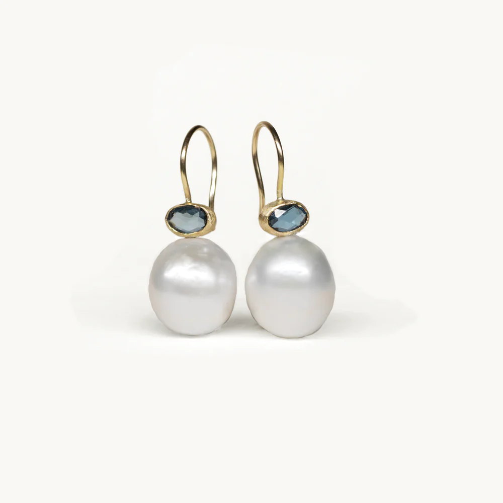 Photo of two pearl drop earrings